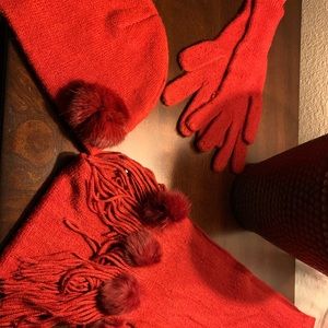 Red scarf, gloves, and beanie